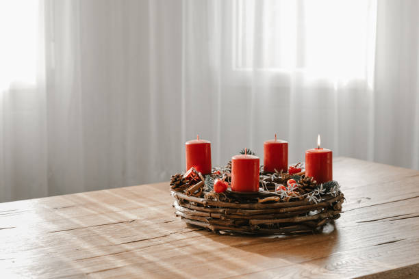 istock Cozy modern home with advent wreath on dining table. 1746378353