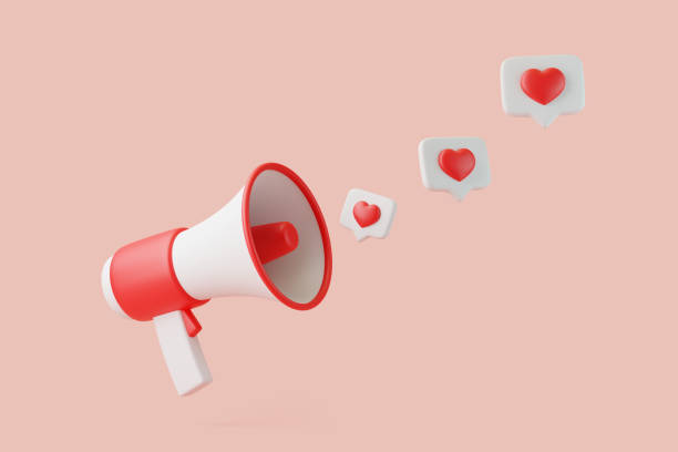 istock Cartoon megaphone heart sign on notification speech bubble on pink background 1746378760