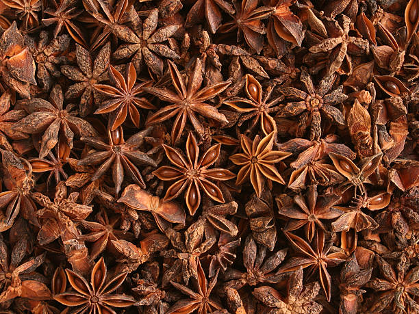 Star anise background Top view of star anise star anise stock pictures, royalty-free photos & images