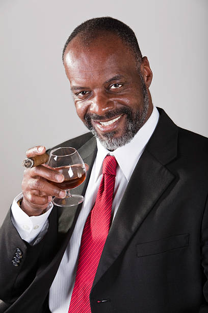 istock Mature Black Male with Brandy and Cigar 174640946