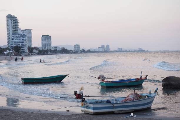 istock Fishing boat and the city 1746417948