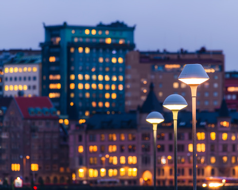 Street lamp in front of cityscape