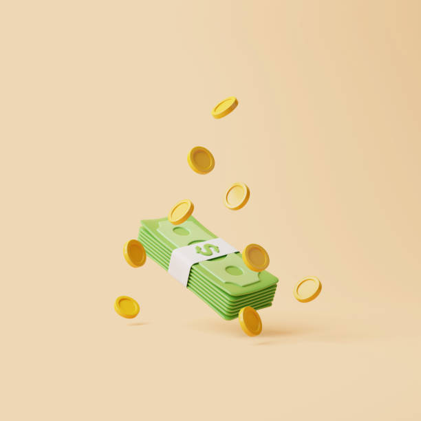 istock Bundle of money with gold coins floating on beige background 1746429751