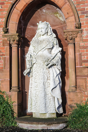 Statue of Queen Victoria inset into a wall