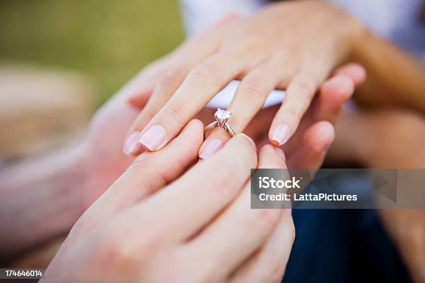 Female And Male Hands Slipping On Engagment Ring Stock Photo - Download Image Now - Engagement Ring, Diamond - Gemstone, Ring - Jewelry