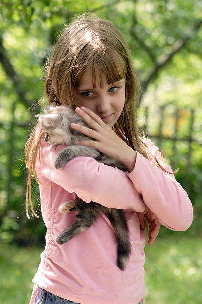 istock Girl with kitten 174646260