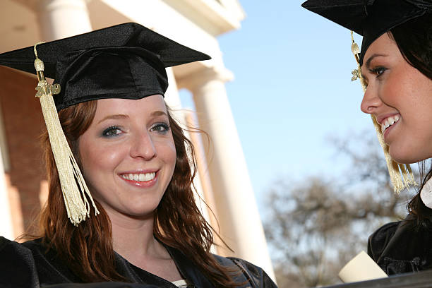 istock Proud Female Graduate with her friend 174646430