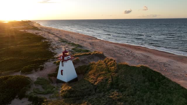 Aerial footage of St. Peter's Bay Lighthouse at sunset
