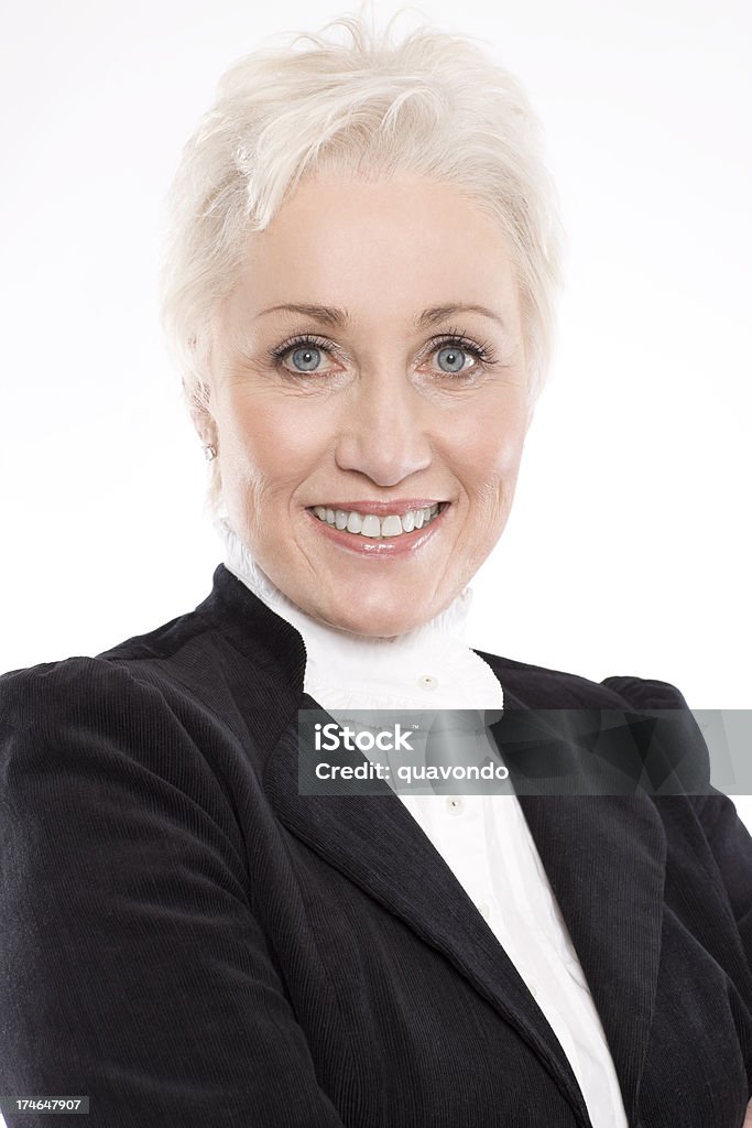 60 adulto Senior donna ritratto in bianco, Copyspace giacca - Foto stock royalty-free di 60-69 anni