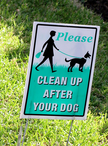 a sign that says Clean Up After Your Message