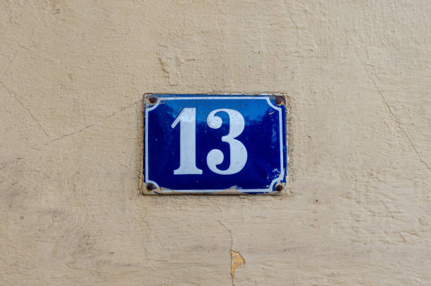 istock House address - number 13 on an blue enamel sign 1746480228
