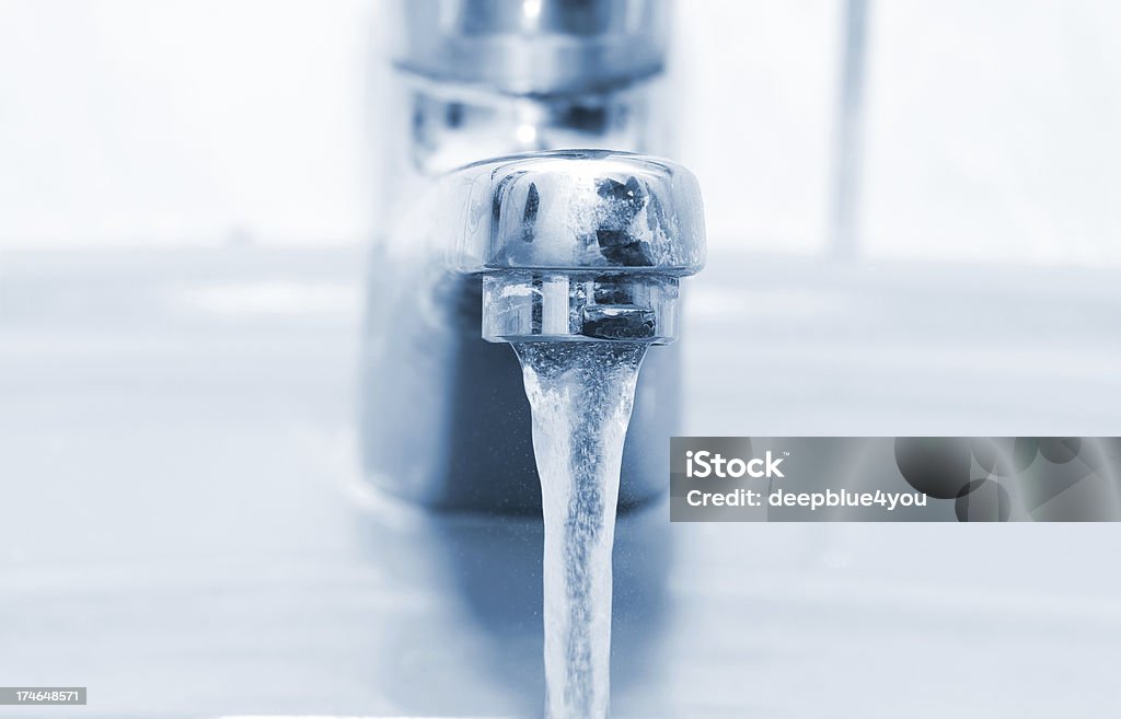 Running faucet "close up of a running faucet, similar shots in my portfolio" Faucet Stock Photo