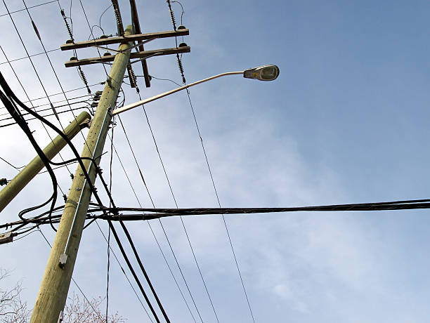 Overhead power cables & lights stock photo