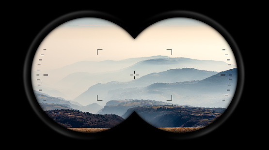 Binoculars point of view with hills and Padana Plain or Po valley with fog. Lessinia plateau (Altopiano della Lessinia), Erbezzo, Verona, Veneto, Italy, Europe.