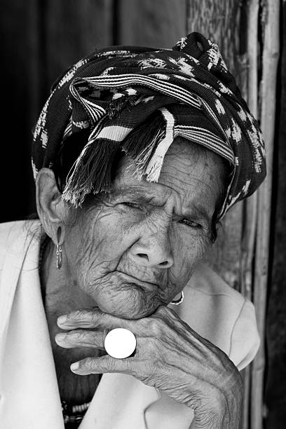 istock Old women on Sumba, Indonesia 174649899