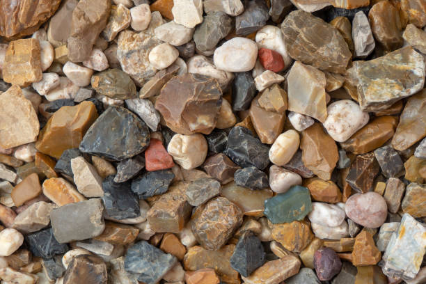 istock Multi-colored stones and pebbles on the beach. Background, texture for wallpaper. 1746506678