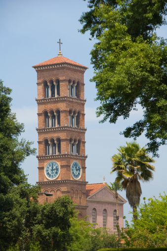 Image of a clock tower and cathedral.