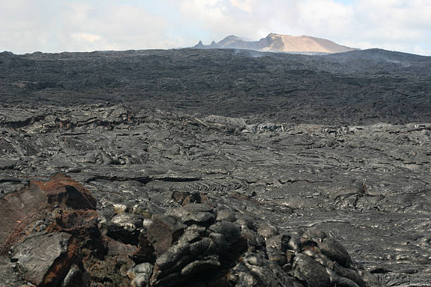 istock volcanic landscape Hawaii molten liquid basalt lava volcano eruption 174650926