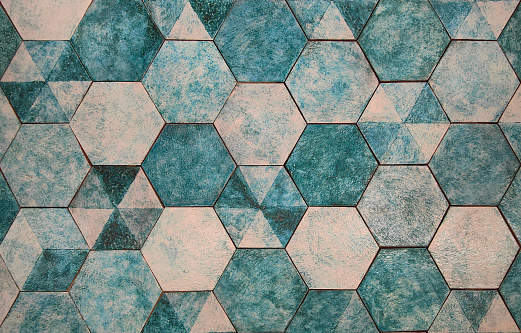 Close-up shot of a hexagonal mosaic tiles textured seamless pattern