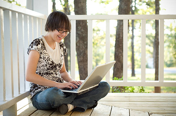 istock teen with laptop 174651944