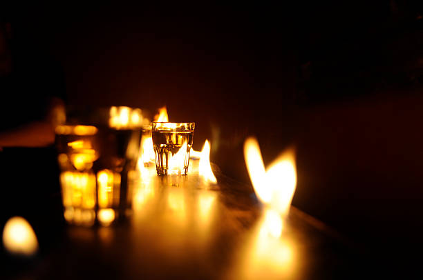 istock bar counter with fire and shot glass 174652368