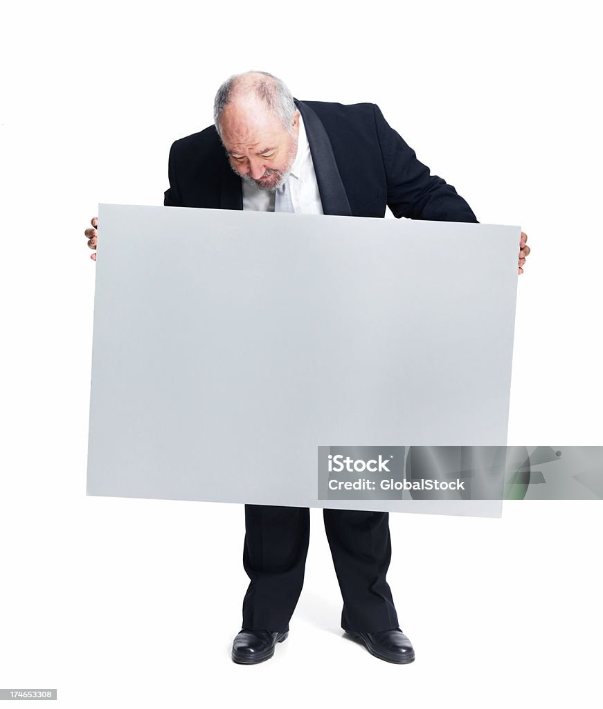 Empresário segurando Placa de manifestação contra fundo branco - Royalty-free Segurar Foto de stock