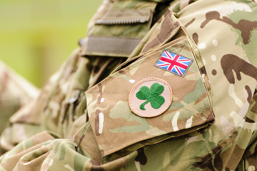 British army soldier from the Royal Irish Regiment wearing a camouflaged uniform
