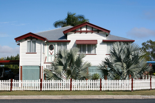 Well maintained aQueenslanderai style home with white picket fence. Click to see more...