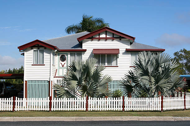 Beautiful Old Queenslander home Well maintained aQueenslanderai style home with white picket fence. Click to see more... queensland photos stock pictures, royalty-free photos & images