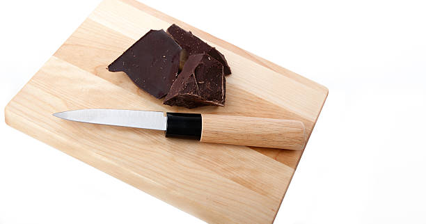 Chipped dark chocolate stock photo