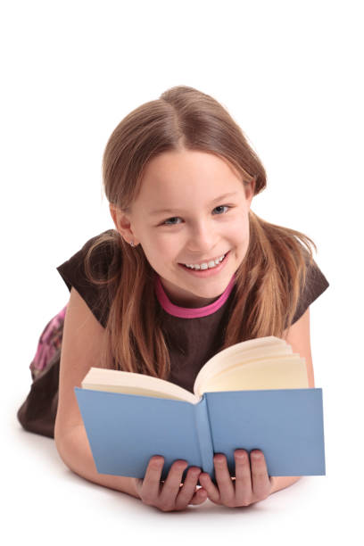 istock ten years old girl reading a book 174653488