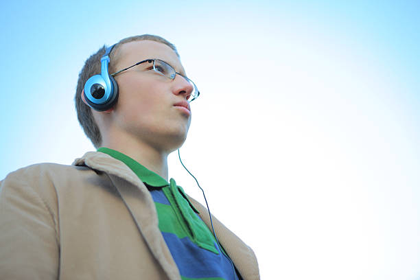 istock Listening to Headphones 174654536