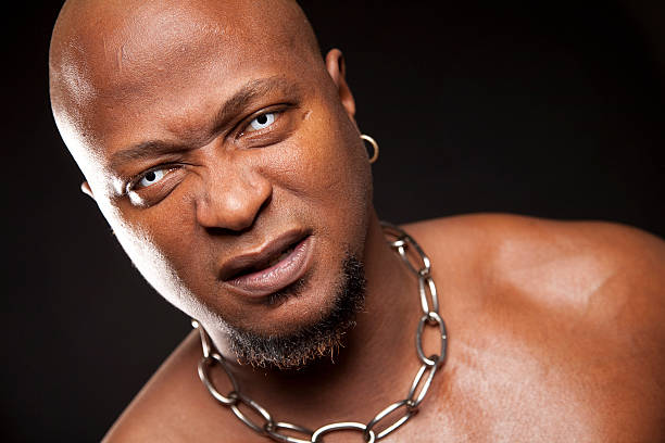 Wrestler With Evil Eyes and Chain Around Neck