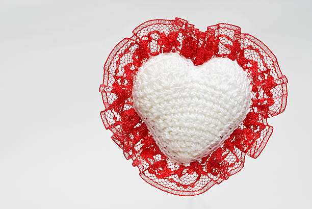 istock Crocheted Heart W Red Lace on White 174655633