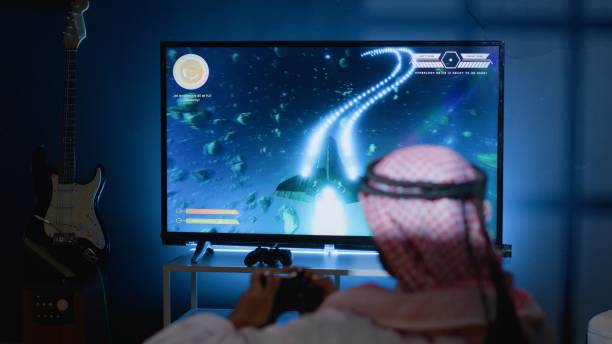 istock Gamer plays SF flying videogame 1746557695