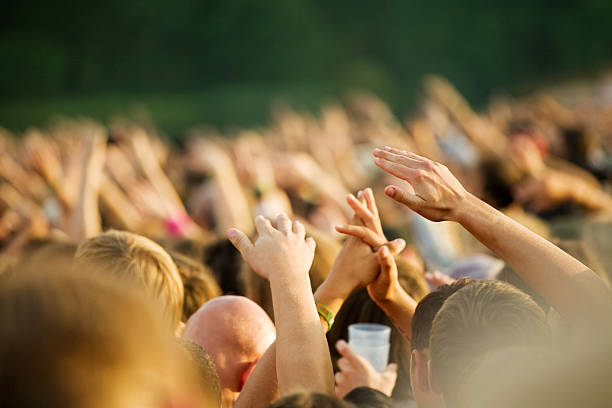 istock hands up in a rock concert 174655986
