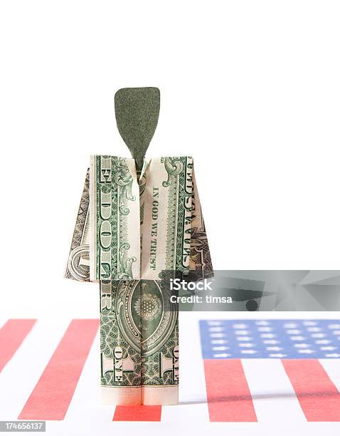 Dollar Person On American Flag Stock Photo - Download Image Now - Folded, US Paper Currency, Achievement