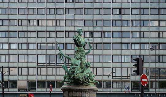 Bronze Boudica staue against summer sky in London, UK. This statue was commissioned in the 19th Century by Queen Victoria, and represents Boudica, or Boadicea, queen of the Celtic Iceni tribe.