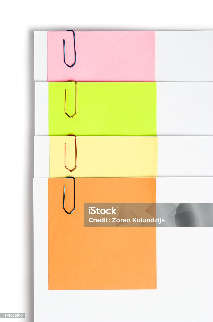 Four documents marked with diferent colored notes Organized documents. Related images: Adhesive Note Stock Photo