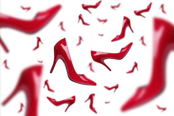 Red Elegant Falling Shoes stock photo
