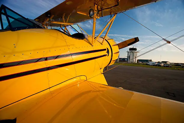 Photo of Old bi plane on the runway