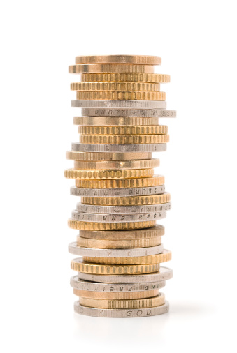 Stack of coins isolated on white. More related images in