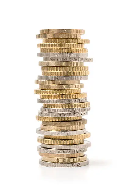 Stack of coins isolated on white. More related images in