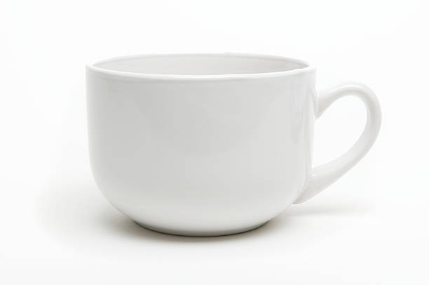 Coffee Mug with Shadow White Background Simple generic white coffee mug with a bit of shadow on white background coffee cup profile stock pictures, royalty-free photos & images
