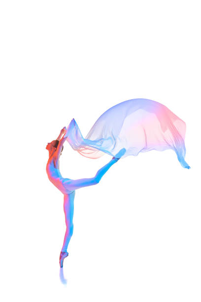 istock Lightness and freedom. Beautiful young ballet dancer in motion with with flying transparent fabric isolated on white background in neon 1746581636