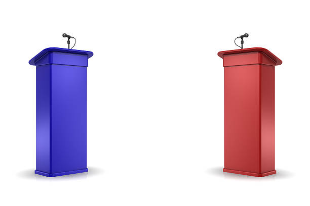 Debate Podiums Two Podiums facing each other one blue one red.Could be a useful image for a debate composition.This is a detailed 3d rendering. lectern stock pictures, royalty-free photos & images