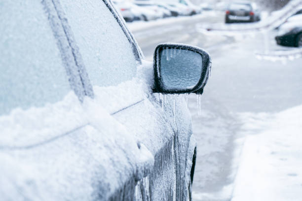 istock car covered with ice after snowstorm 1746586182