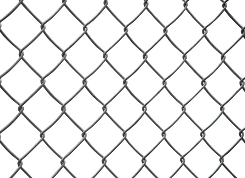 Closeup wire fence aginst blur background
