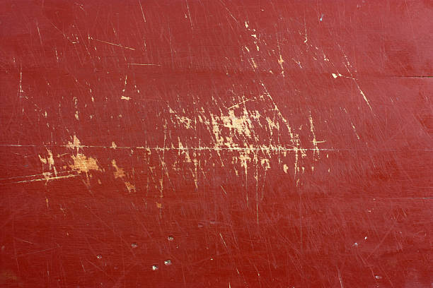 istock Red painted scratched wood abstract background 174659143
