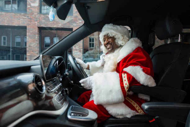 istock Santa Driving in the City 1746598572